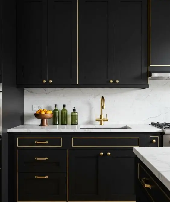 Bold Black Cabinets with Gold Touches