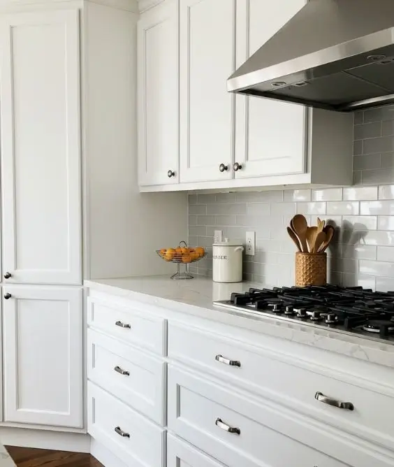 Sleek White Cabinets with Hidden Handles